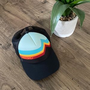 Saucony hat. Black with rainbow style colours. new without tags.